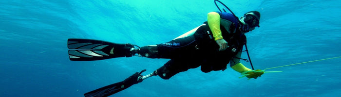 Have a disability and want to learn to dive? We are trained to help with disabilities. Please call and discuss with one of our Scubility Instructors. 